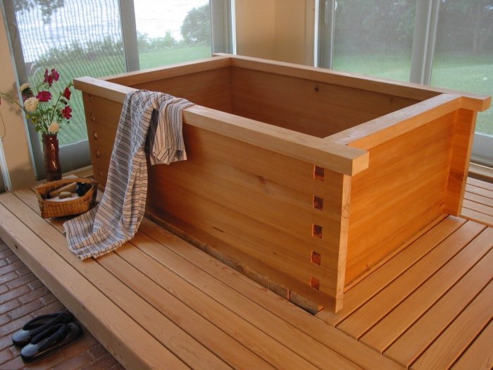 Tanchit salle de bain sur plancher bois