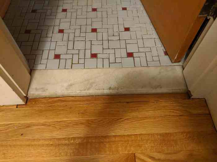 Shower remodel tile marble granite tumbled curb floor master bathroom bath