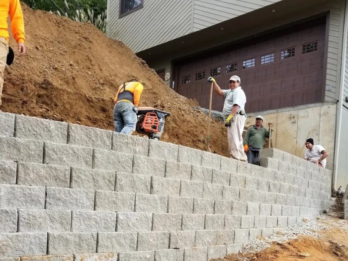 Retaining masonry paving